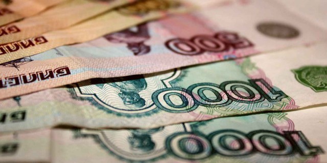 Рубль повысился в