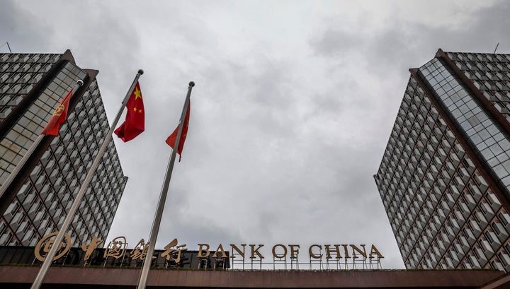 Банк Китая ослабил курс